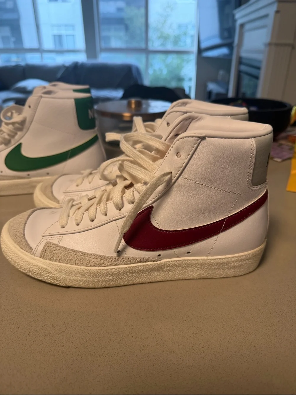 Nike Kids White High-Top Sneakers with Red Swoosh